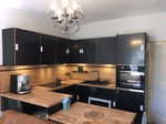 New Kitchen with Black Units